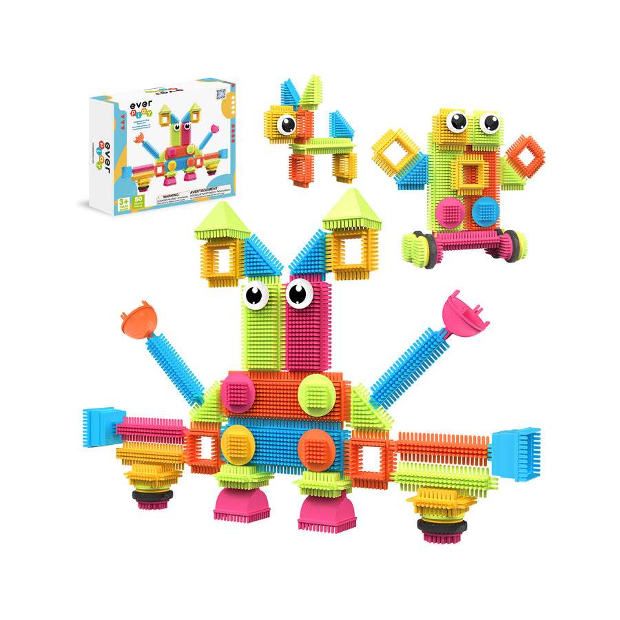 Colorful bristle shape building block creature models and packaging box isolated on white.