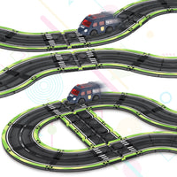 Toy police cars driving along different tracks built with magnetic tile pieces.