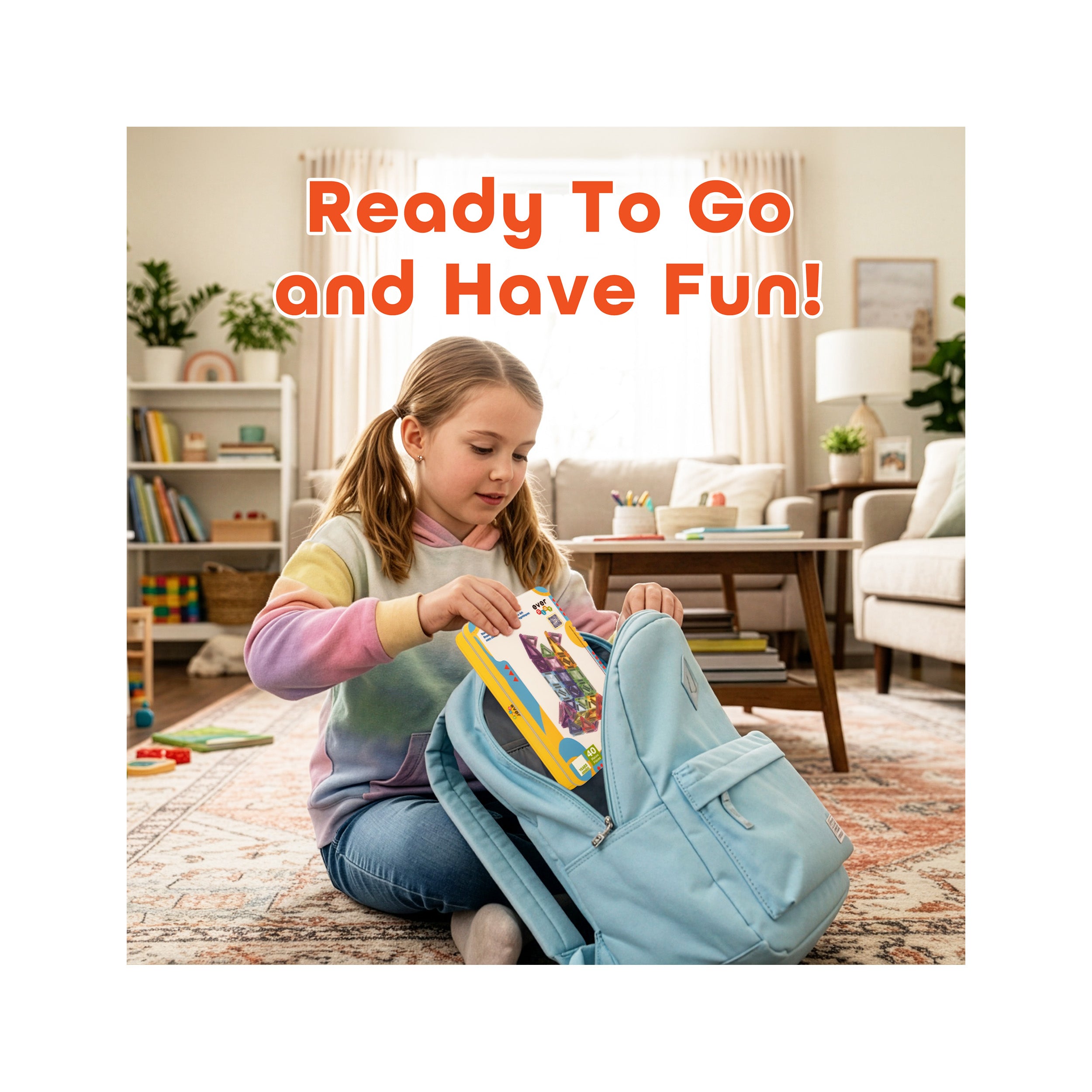 A young girl packs a EverPlay box into a blue backpack. Text overlay: "Ready To Go and Have Fun!"