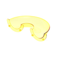 Single translucent yellow curved plastic building piece with side connector pegs