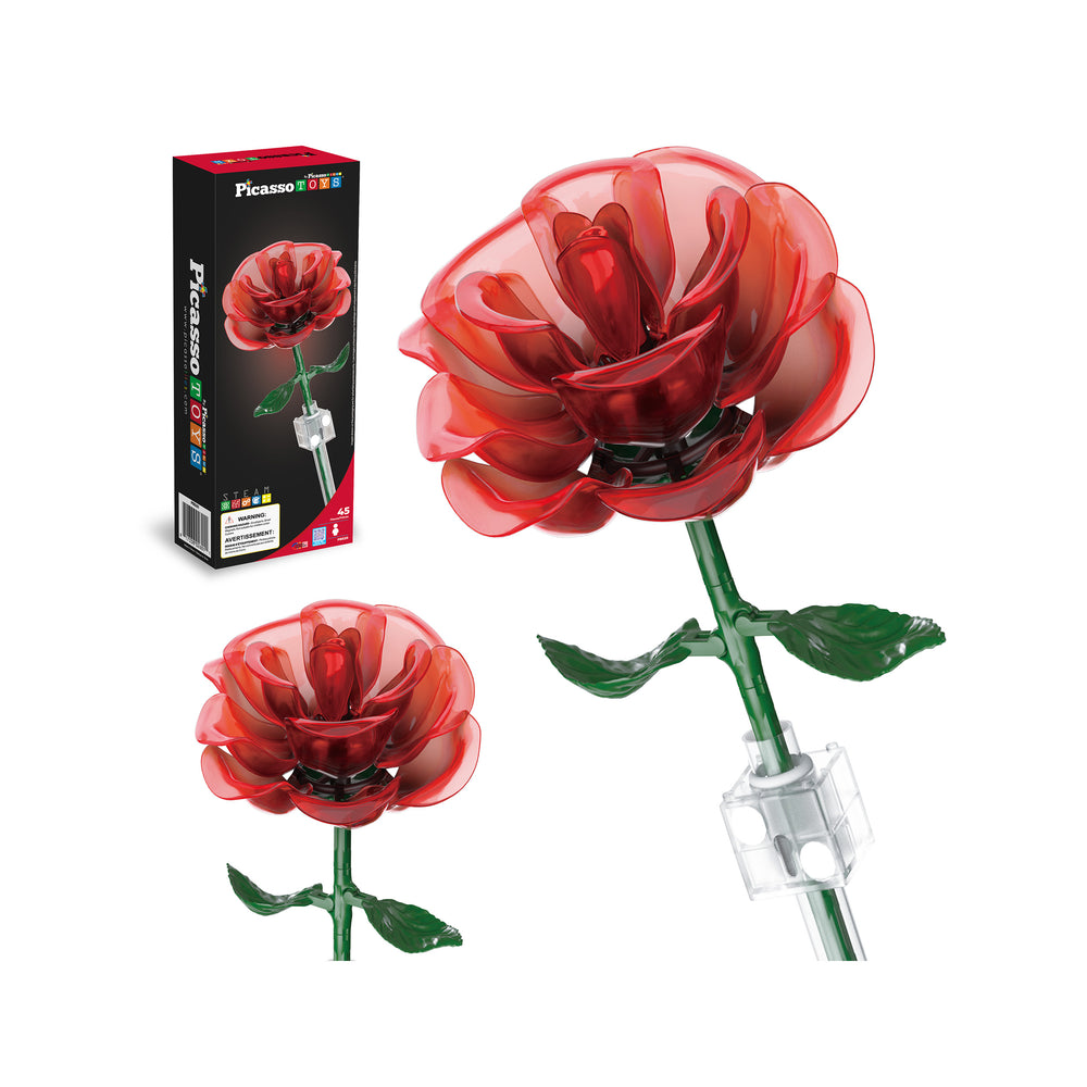 A translucent red rose toy flower built with green stem and leaves, shown next to its PicassoTiles box packaging.