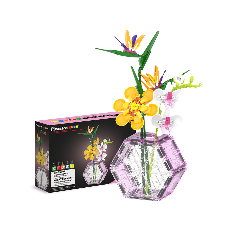 PicassoTiles botanical flower bouquet building brick set in a pink clear magnetic tile vase next to packaging box.