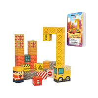 Construction-themed magnetic cube playset featuring a crane, dump truck, worker figure, and metal storage tin.
