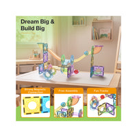 Magnetic marble run set on a table under "Dream Big & Build Big" with magnetic connection feature panels.
