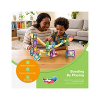 Mother and son playing with a magnetic marble run set below "Bonding By Playing" text and developmental icons.
