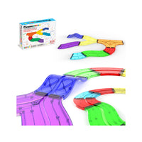 Magnetic race track expansion pieces including curves and speed bumps laid out