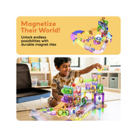 A child playing with a colorful magnetic tile track set under promo text reading "Magnetize Their World!".