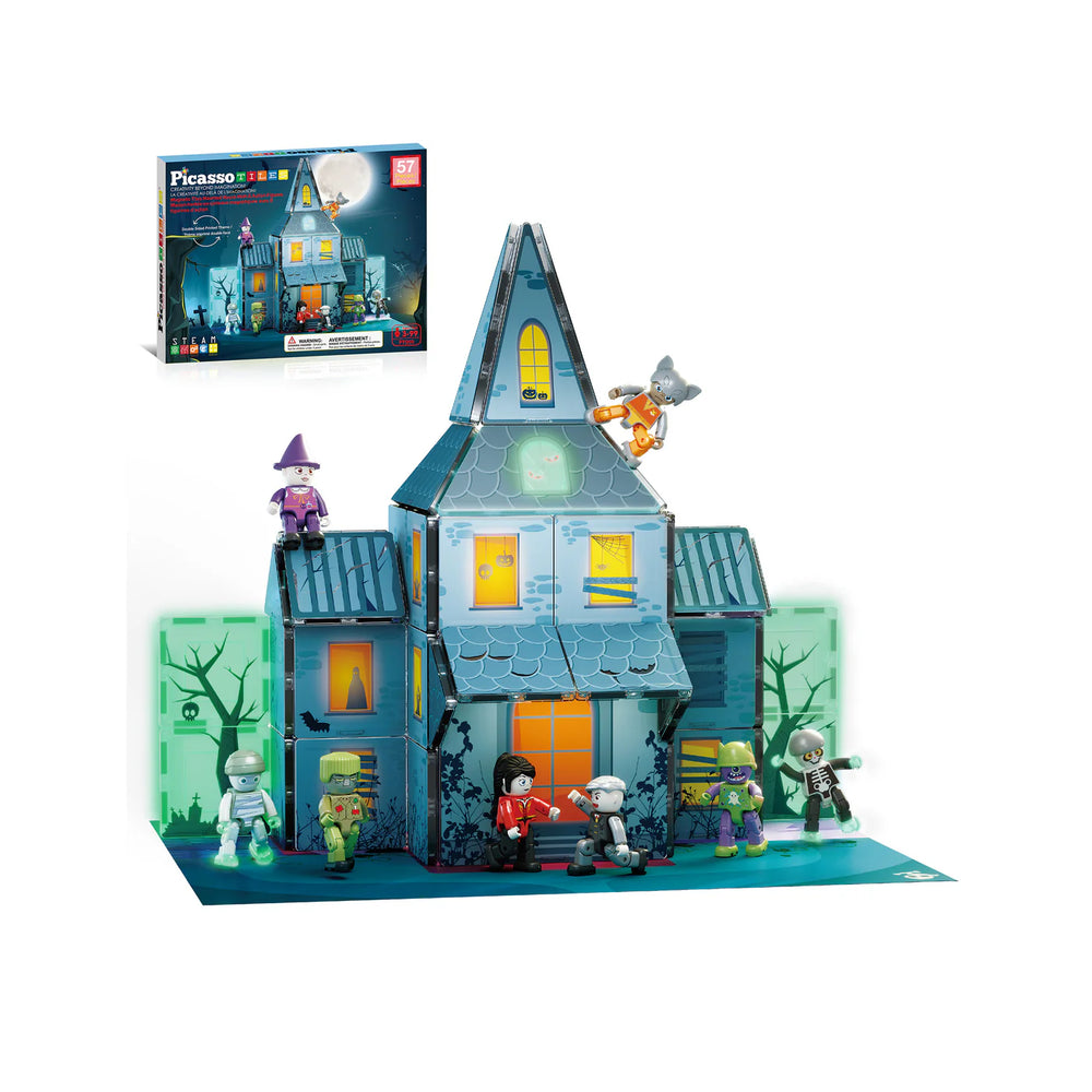 PicassoTiles haunted house magnetic building set featuring dark blue panels, spooky graphics, and monster figurines.